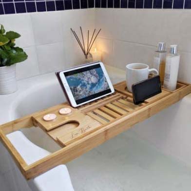 Use a trendy tray across your bath for all your bathing items Use a trendy tray across your bath for all your bathing items